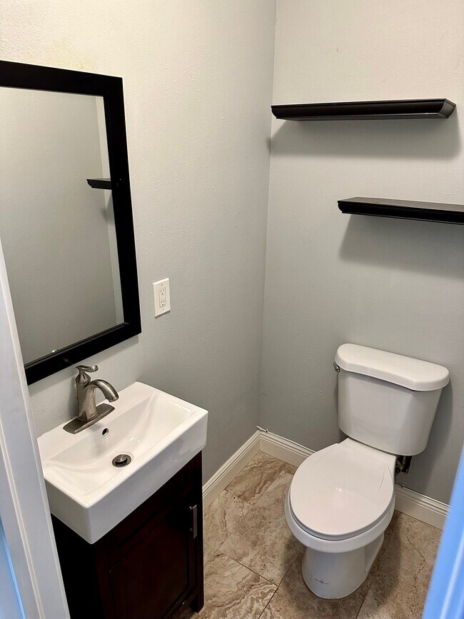 1/2 bath downstairs - 2871 S Pines Dr