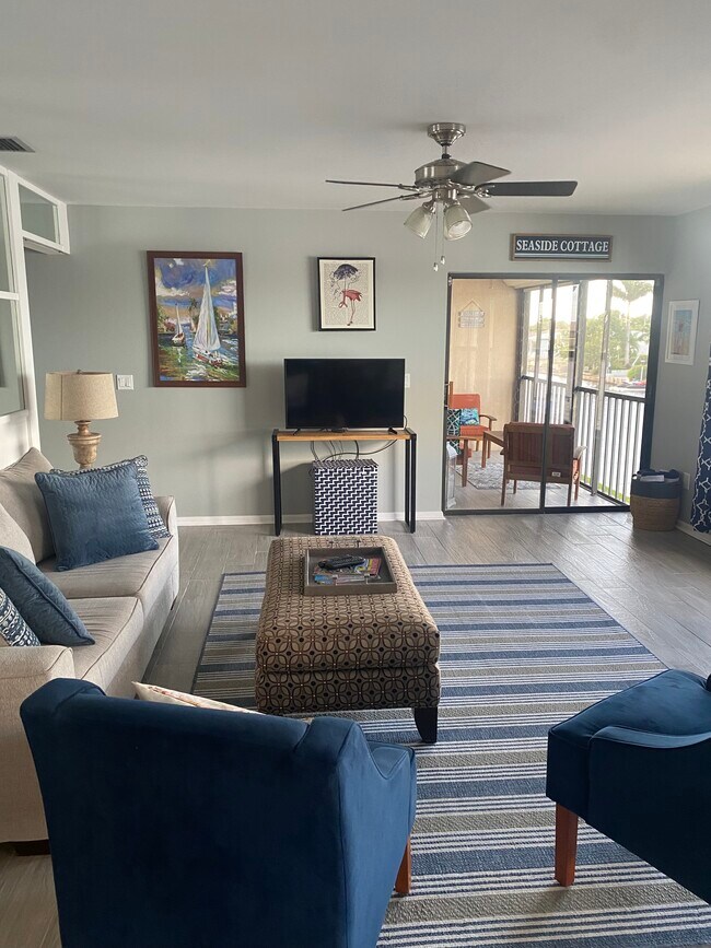 Living Room into Lanai - 159 SW 47th Ter