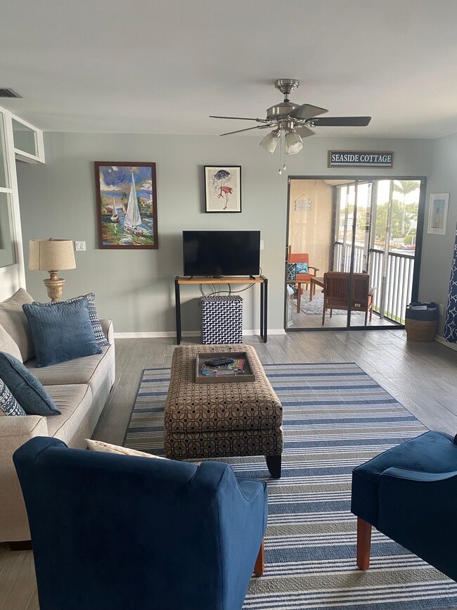 Living Room into Lanai - 159 SW 47th Ter