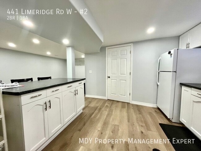 Building Photo - Welcome home to this warm and inviting low...