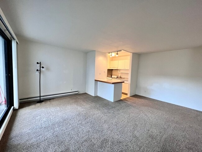 Building Photo - Cozy 1 bedroom on lush courtyard includes water / garbage & 1 parking spot.