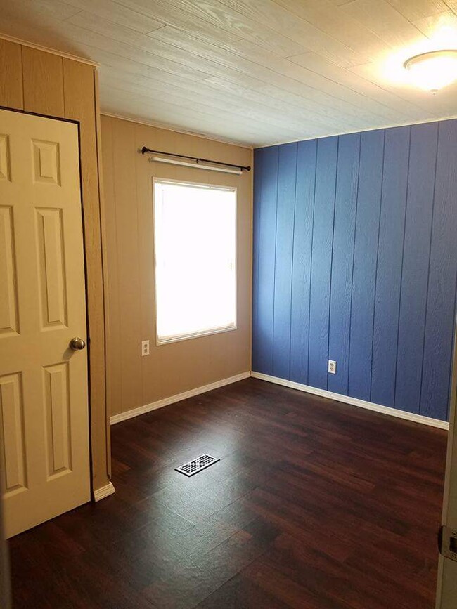 Bedroom, vinyl flooring, closet. - 1000 Mona Street