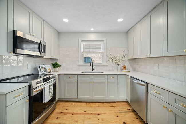 Photo - COMPLETELY RENOVATED 5BR/2.5BA with Office - North End Property with Garage Townhome