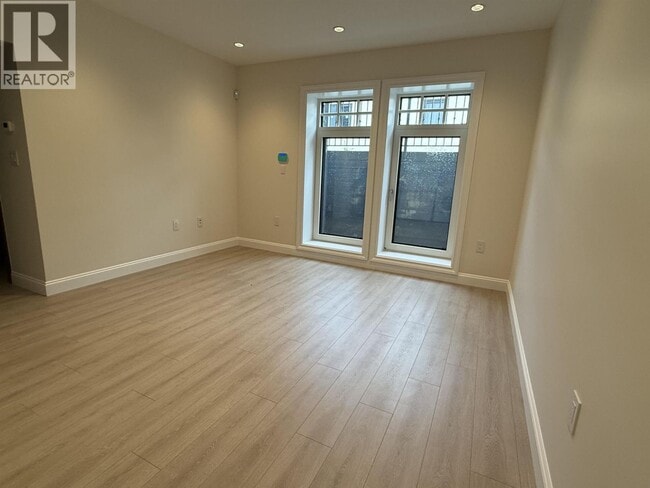 Photo du bâtiment - 1115 W 48th Ave