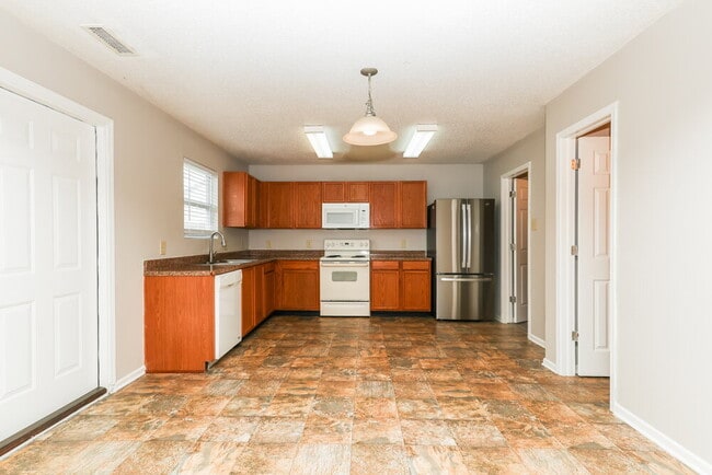 Building Photo - 5660 Grassy Bank Dr