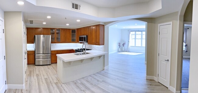 Panoramic photo of kitchen and grand room - 30 E Julian St Apartment