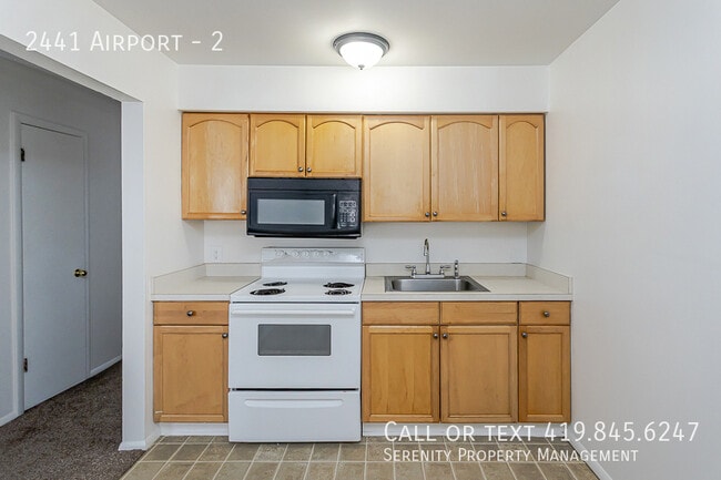 Building Photo - 2441 Airport-2