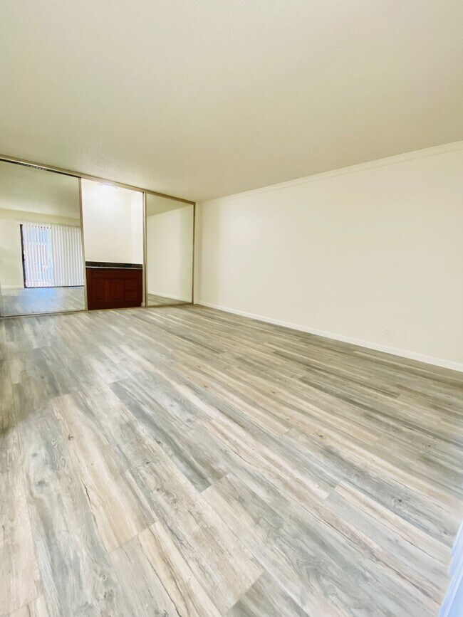 Living with mini bar and storage - 350 N Civic Dr
