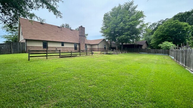 Building Photo - Renovated 5 Bedroom 3 Bath Home with 2 Car...