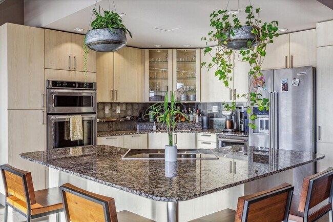 Euro cabinetry and custom finishes in the kitchen - 1499 Blake St