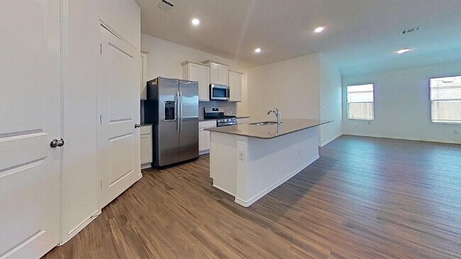 Building Photo - Cozy Kyle Home Awaits You