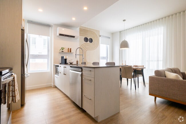 2 chambres, 2 salles de bain - 107 m² - Cuisine - Loggia Saint-Lambert