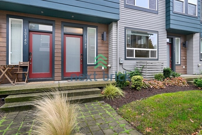 Building Photo - A Beautiful Corner Home Designed for Comfort, Light & Community!
