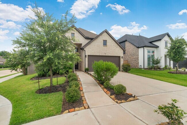 Foto del edificio - 10718 Blossom River Dr