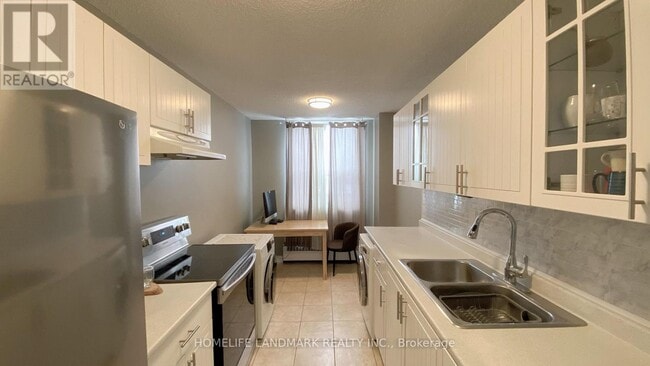 Photo du bâtiment - 175-175 Hilda Ave