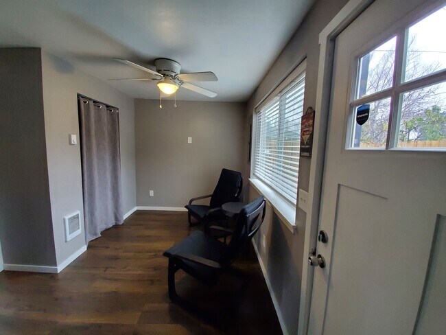 Sitting room semi-furnished. - 6117 SE Steele St