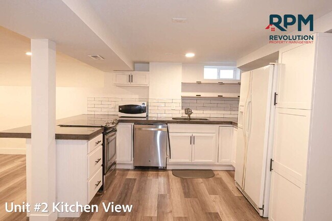 Building Photo - "Charming 2-Bed Duplex on Washington Blvd – Spacious 1421 Sq Ft with 2 Full Baths!"