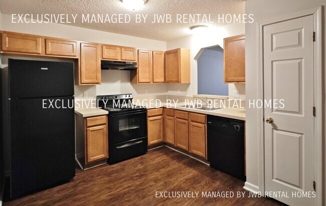 Building Photo - 8432 McGirts Village Ln