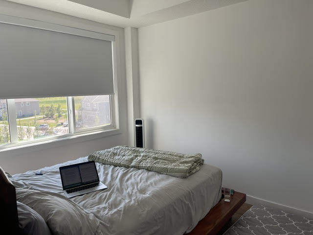 Photo du bâtiment - Modern 2 Bedroom + Den Condo with Underground Parking in Skyview Ranch (IP054)