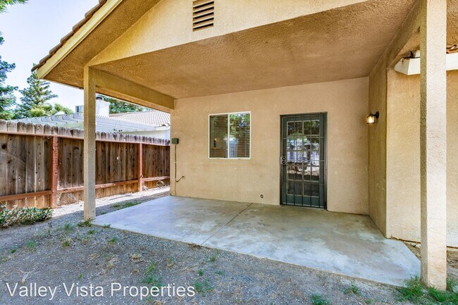 Building Photo - 4 br, 2 bath House - 6360 N Cleo Avenue