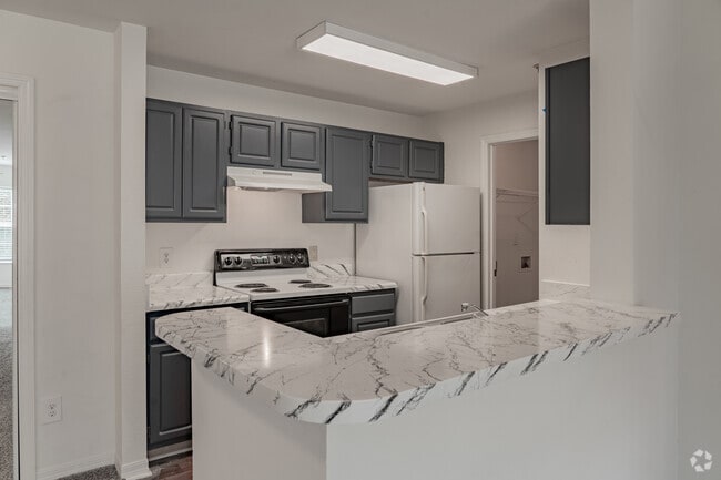 2BR, 2BA - 1,028SF - Kitchen - The Grove at Cary Park