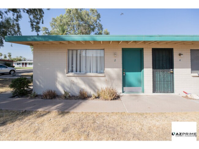 Building Photo - Find your Happy Place in this Charming Tem...