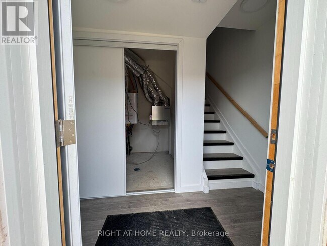 Photo du bâtiment - 119 HighRiver Trl