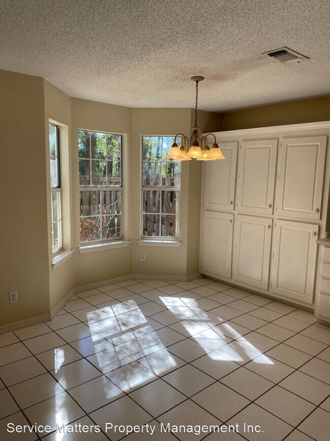 Building Photo - 3 br, 2 bath House - 6969 Weatherwood Dr