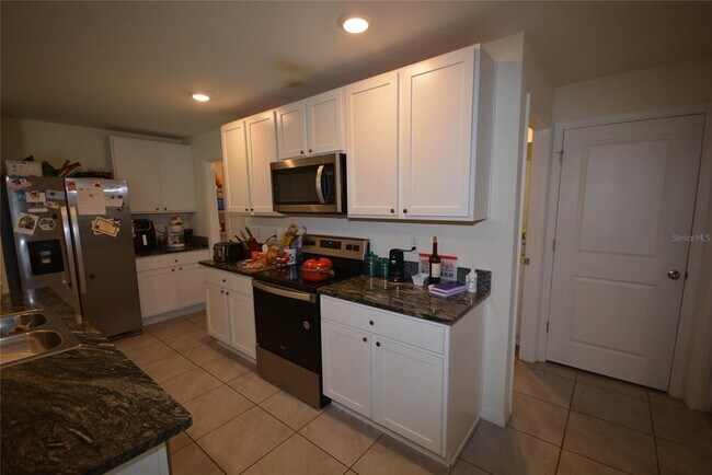 Building Photo - 12159 Lily Magnolia Ln