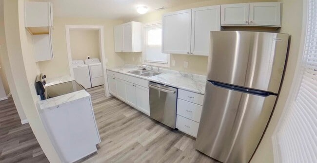 Building Photo - 3D Tour Available - Newly Remodeled + Cove...