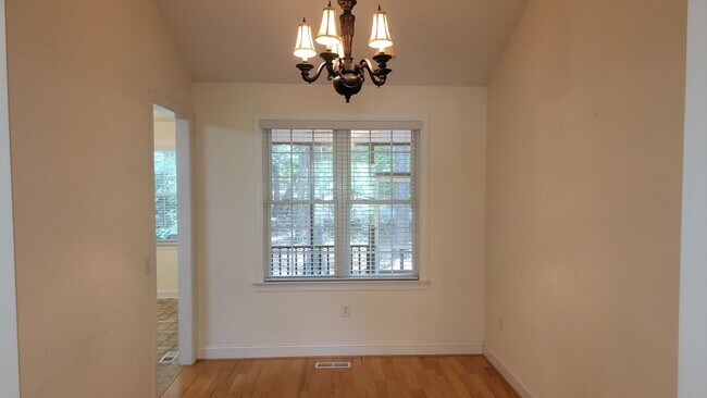 Building Photo - Backing directly to the golf course in the gated community of Carolina Trace, this spacious 3-bed...