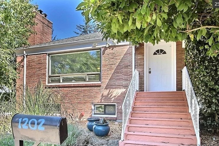 Exterior, new windows & doors - 1202 S Cloverdale St (Seattle, WA)