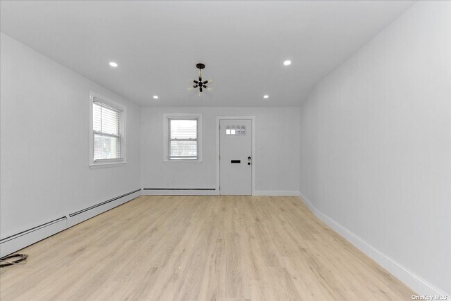 Building Photo - 129-14 135th Ave