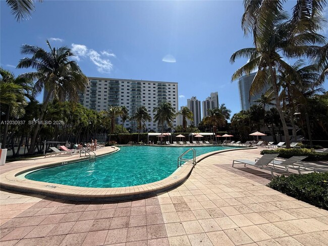 Building Photo - 19380 Collins Ave