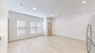 Located at 5400 School Ave in Hudsonville, MI, this single-floor, one-bedroom, one-bathroom residence offers a well-organized and efficiently designed layout. Light hardwood-style flooring runs continuously throughout the unit, lending a clean, cohesive aesthetic to every room.

The open-concept living, dining, and kitchen area forms the heart of the home. The kitchen is outfitted with warm-toned wood cabinetry, light countertops, a subway tile backsplash, and a full suite of stainless steel appliances including a range, microwave, dishwasher, and refrigerator. Recessed lighting illuminates the space, which flows naturally into the combined dining and living area.

The bedroom is a comfortably sized retreat featuring multiple windows fitted with horizontal blinds, allowing for ample natural light and privacy control. The room connects directly to a dedicated closet, providing convenient storage. The full bathroom features a single-sink vanity with wood cabinetry, light countertop, a tub-shower combination with chrome fixtures, and a clean, all-white finish.

Additional practical spaces include a hallway, a laundry room, and a utility room, rounding out the functional offerings of this thoughtfully laid-out residence.