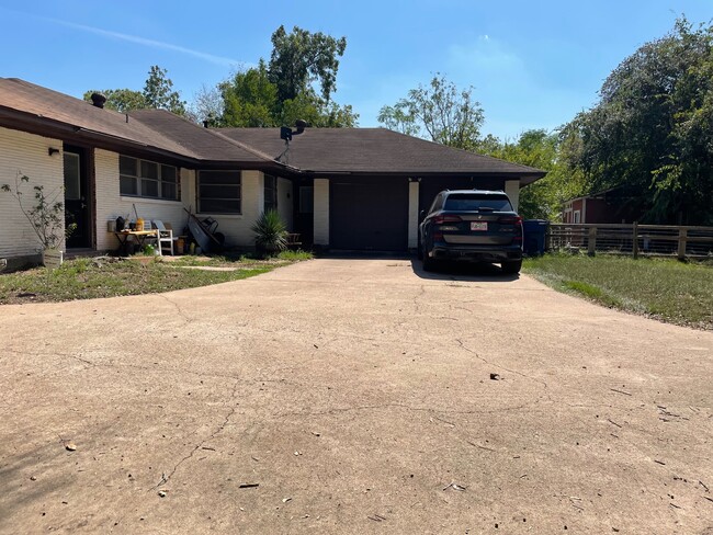 Back of the House with a two-car Garage - 229 University Dr