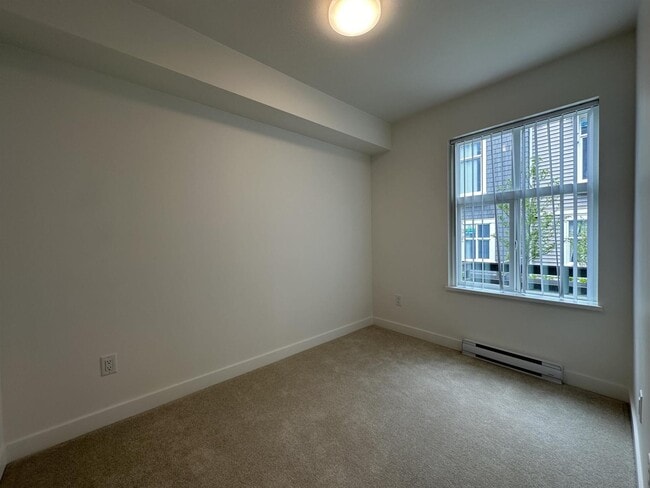 Building Photo - 14151-1458A 58A Ave.