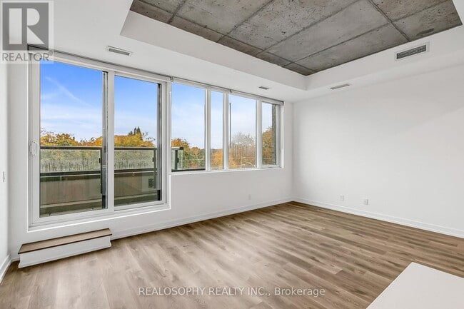 Building Photo - 115-115 Larchmount Ave