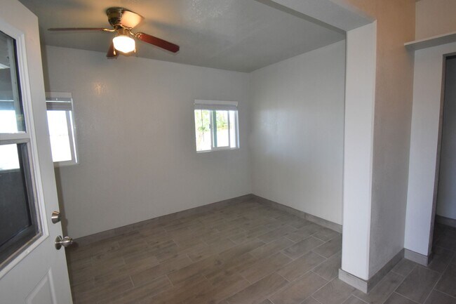 Building Photo - Studio with Private Parking, Patio, Laundr...