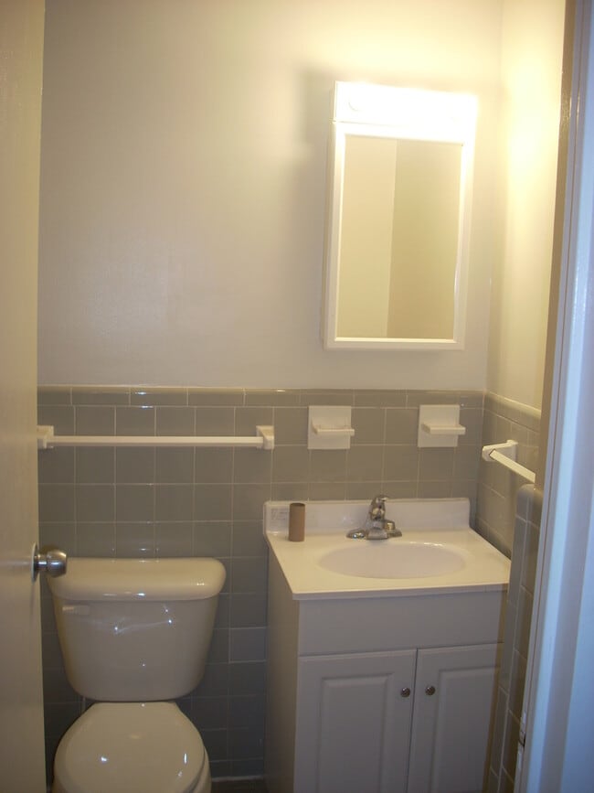 Building Photo - A renovated efficiency located on the four...