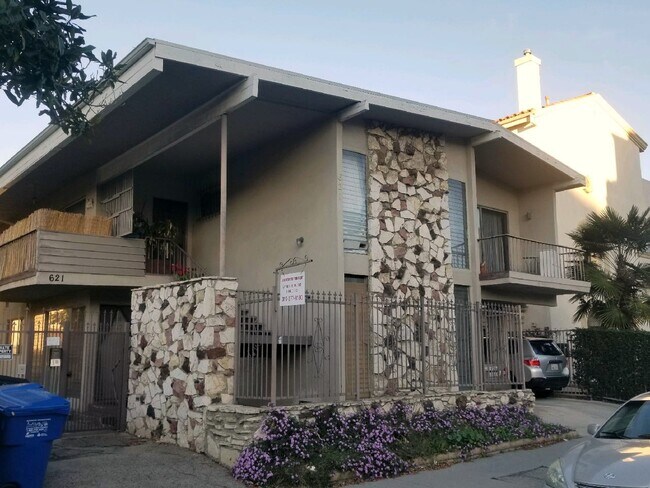 SECURITY GATED BUILDING WITH PHONE ENTRY SYSTEM & SECURITY CAMERAS - 621 S Wilton Pl