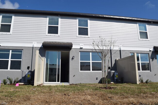 Building Photo - 3 br, 2.5 bath Townhome - 17125 Blowfish D...
