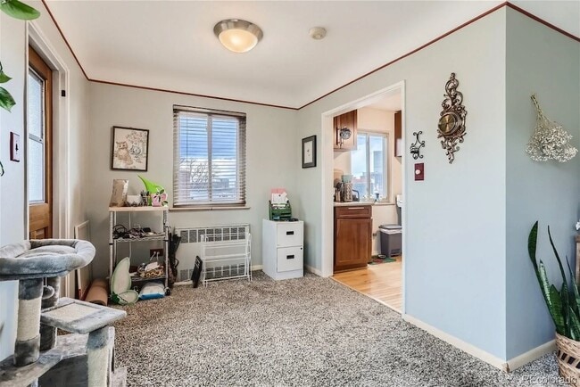 Living Room w West and South facing walls, lots of light. - 1175 Emerson St #302