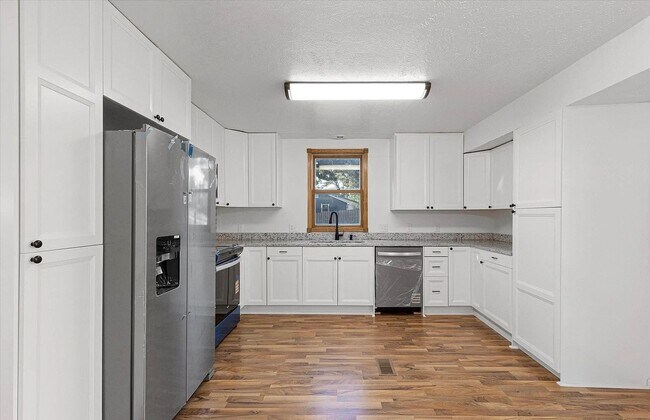 Foto del edificio - Cozy elegance meets modern convenience in ...