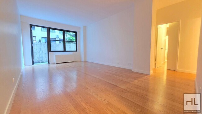 Building Photo - Midtown East 2-Bed, 2-Bath with Private Patio