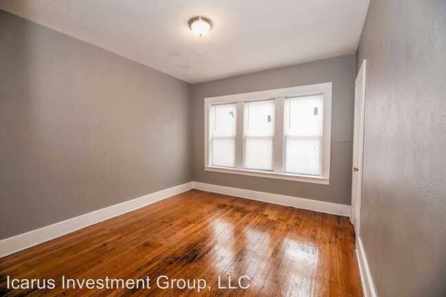 Building Photo - 7736 S Colfax Ave