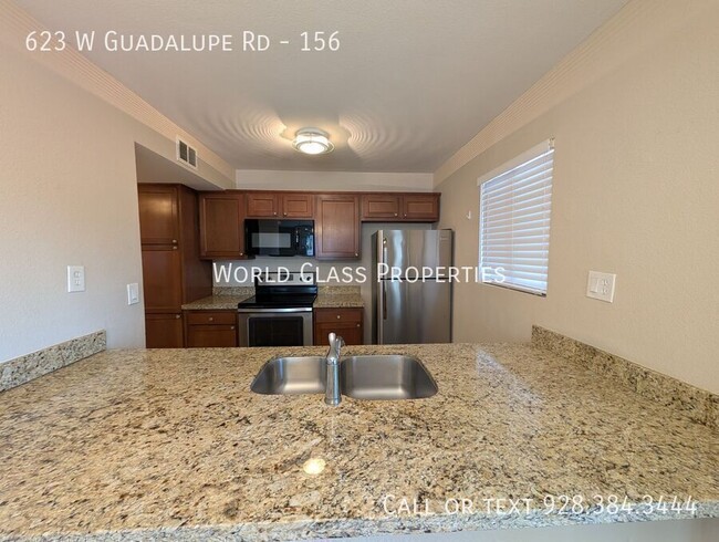 Building Photo - 623 W Guadalupe Rd