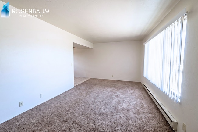 Building Photo - Cozy Upstairs 2-Bedroom Apartment with Shared Fenced Yard