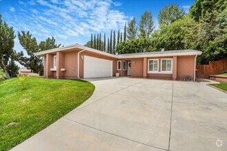 Building Photo - 7365 Pomelo Dr