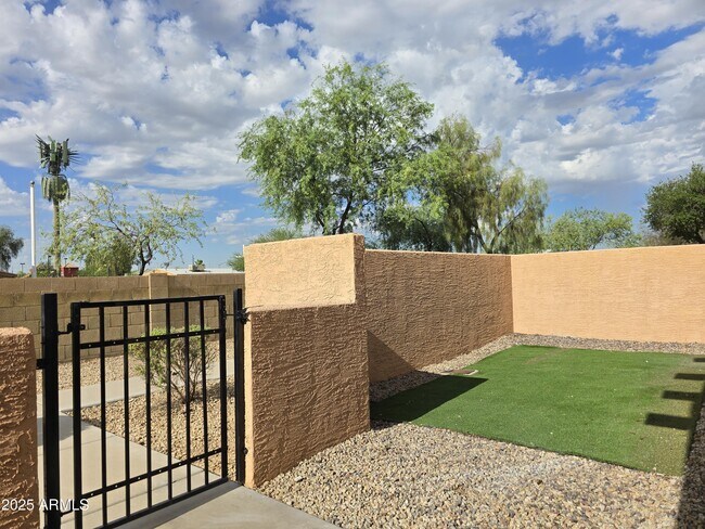 Building Photo - 8940 W Olive Ave